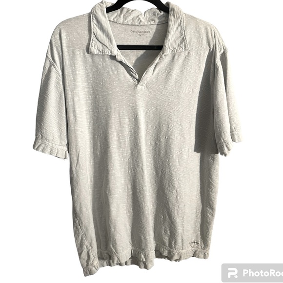 Calvin Klein Jeans brand lightweight Polo. Very light green colored w texture. - Picture 1 of 1